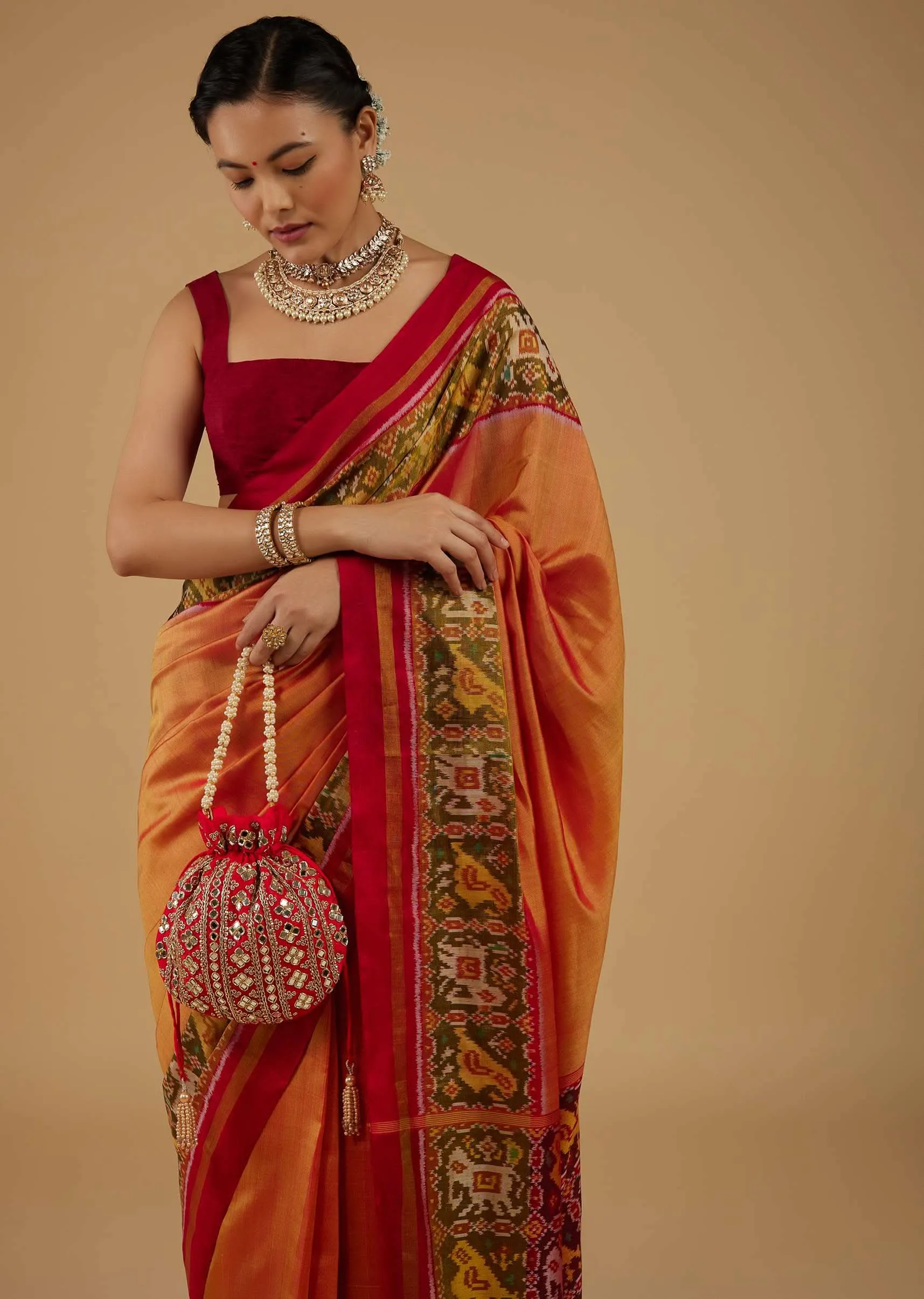 Carrot Orange Saree In Silk With Ikat Weave Patola Work