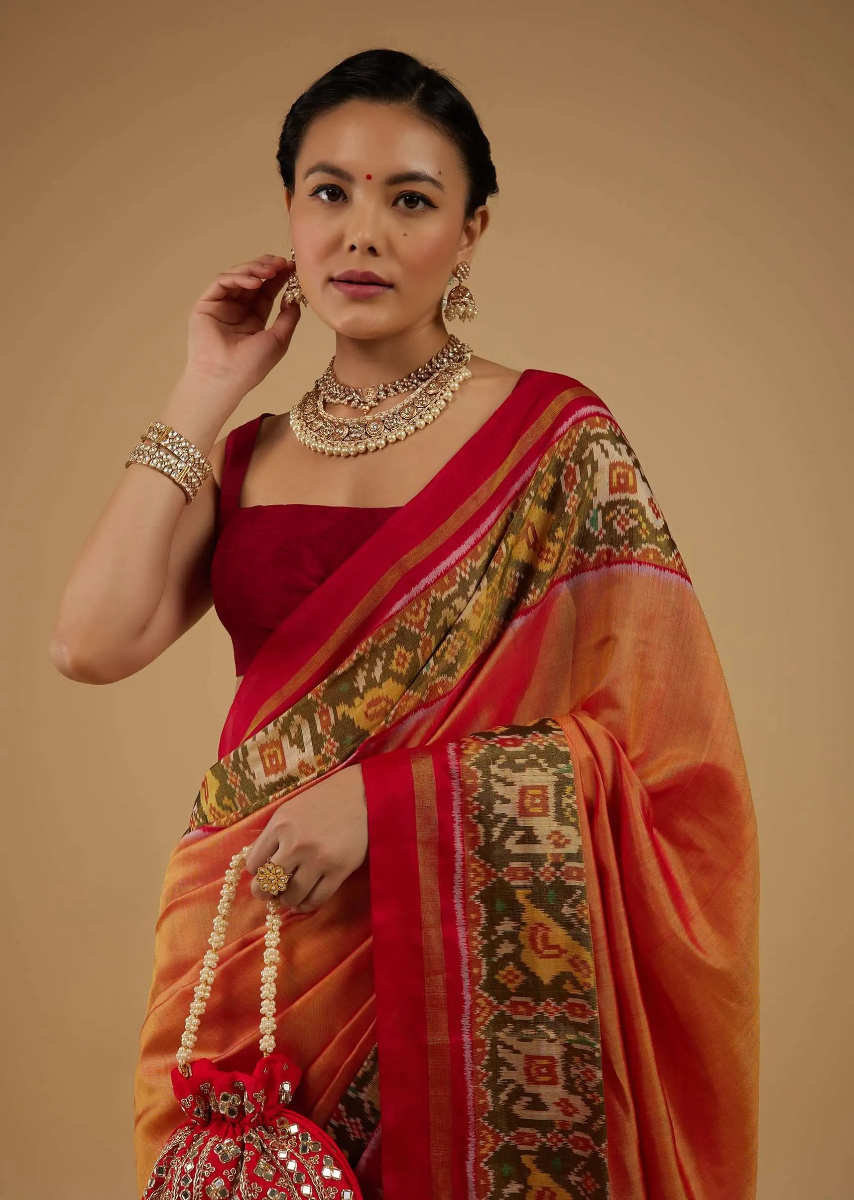 Carrot Orange Saree In Silk With Ikat Weave Patola Work